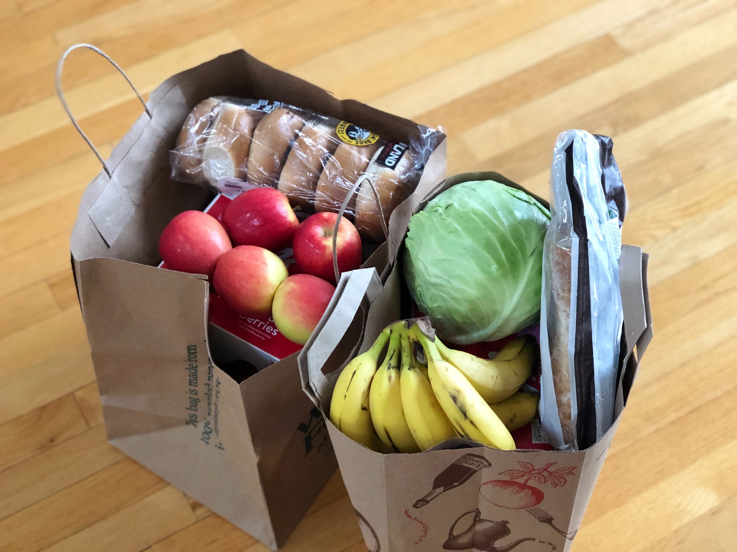 Brown shopping bags filled with food groceries