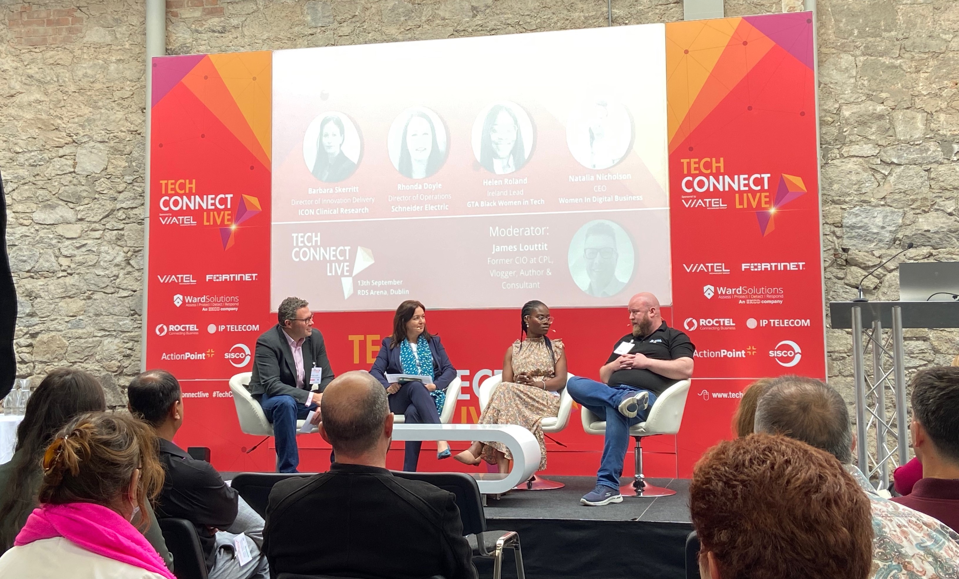 Sean Doran speaking with the Diversity in STEM panelists at TechConnect