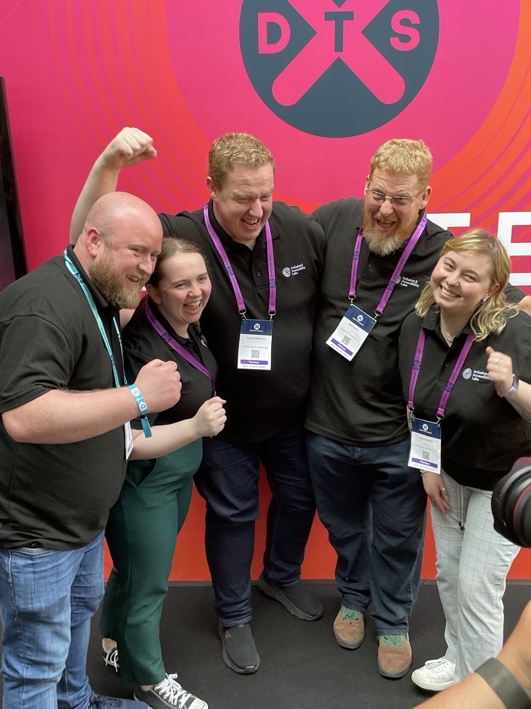 Sean Doran, Sarah O'Boyle, Kyran O'Mahoney, Neil Richins and Adela Buliman cheering at the Dublin Tech Summit