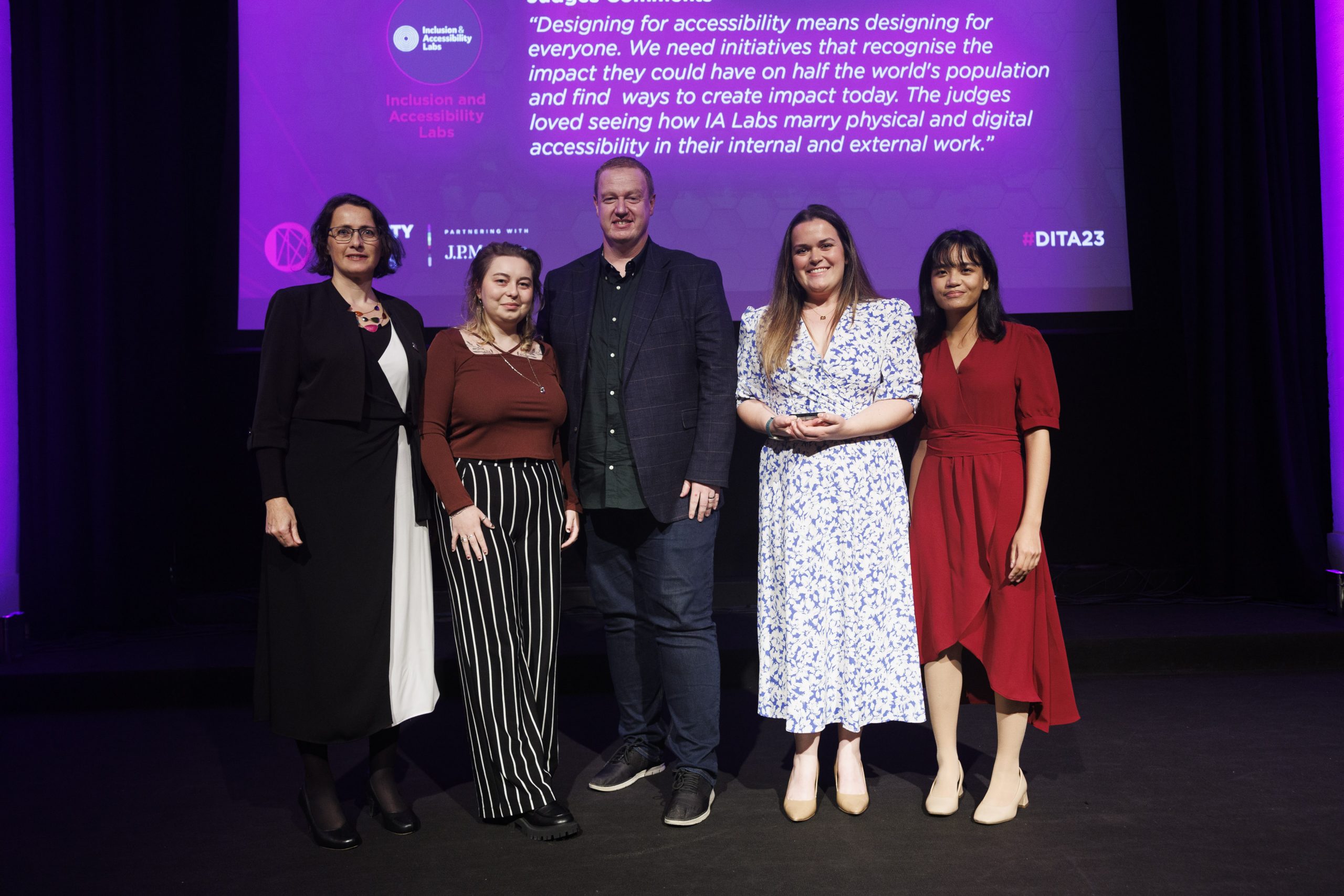 Adela Buliman, Kyran O'Mahoney, Ellie Owens and Diana Penamora being awarded at the Diversity in Tech Awards